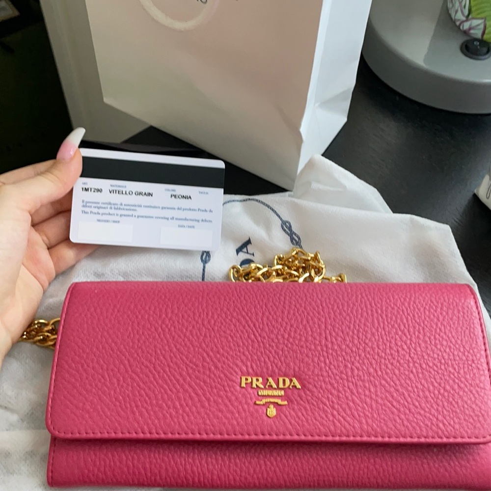 This is a Prada wallet on a chain.